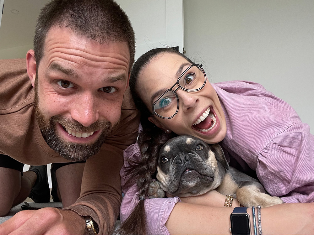 Gus the dog and his human parents